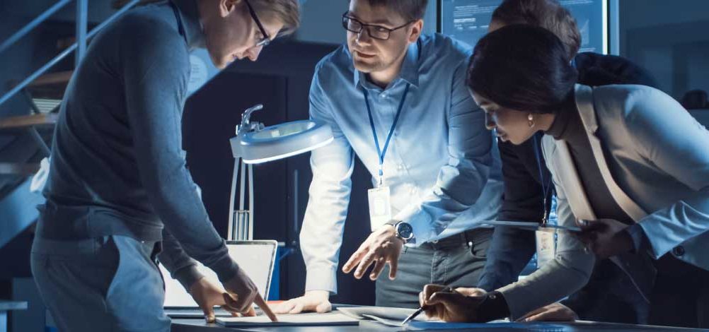 team at a table discussing